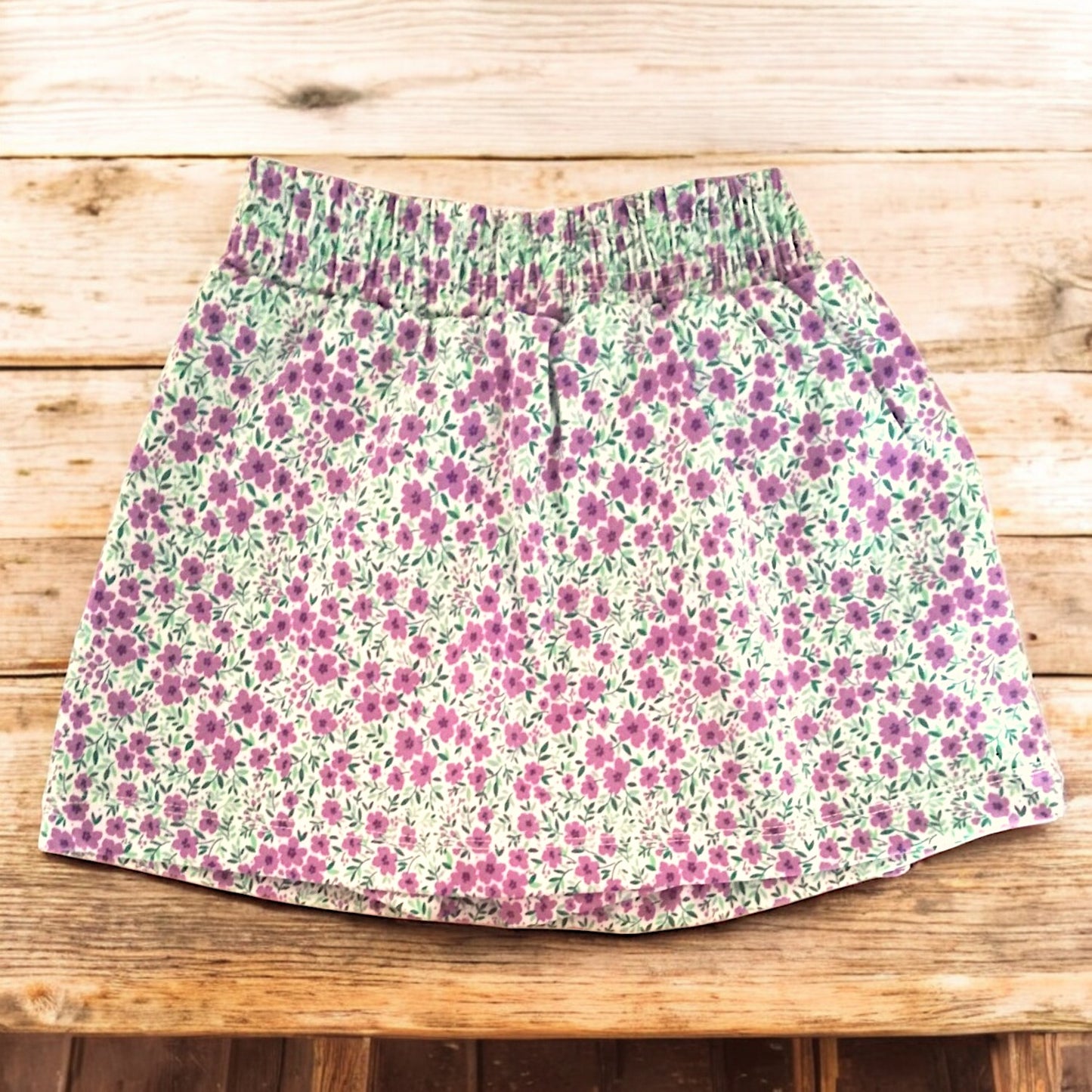 Falda Short Niña Floreado con lazo